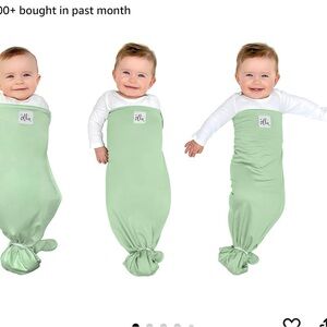 Two Ollie swaddles - only used a few times -Meadow and Sky colors